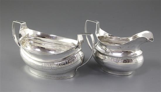 A George III Irish silver sugar bowl and cream jug, maker possibly Robert Breading, bowl length 210mm, weight 12oz/375grms.